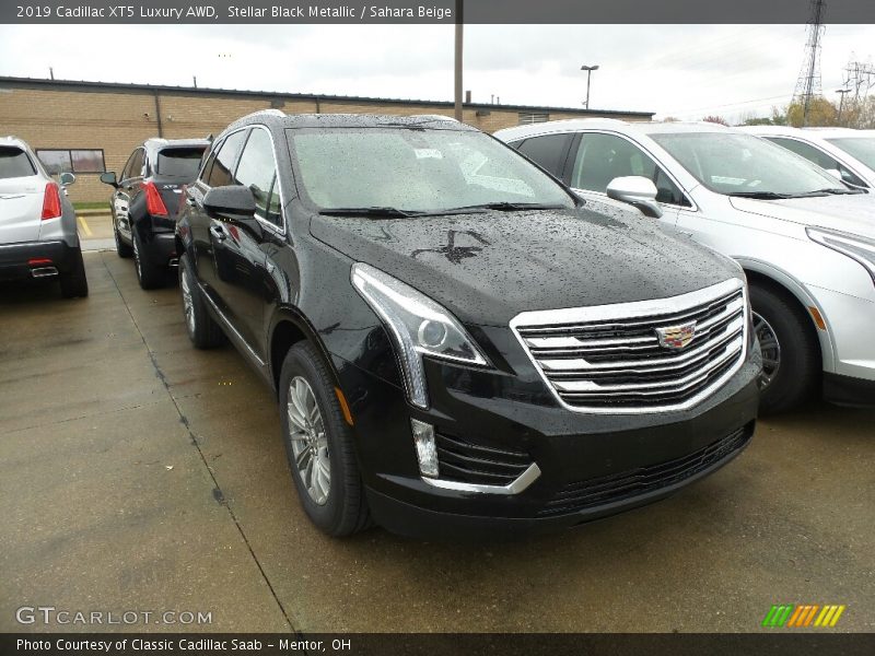 Stellar Black Metallic / Sahara Beige 2019 Cadillac XT5 Luxury AWD