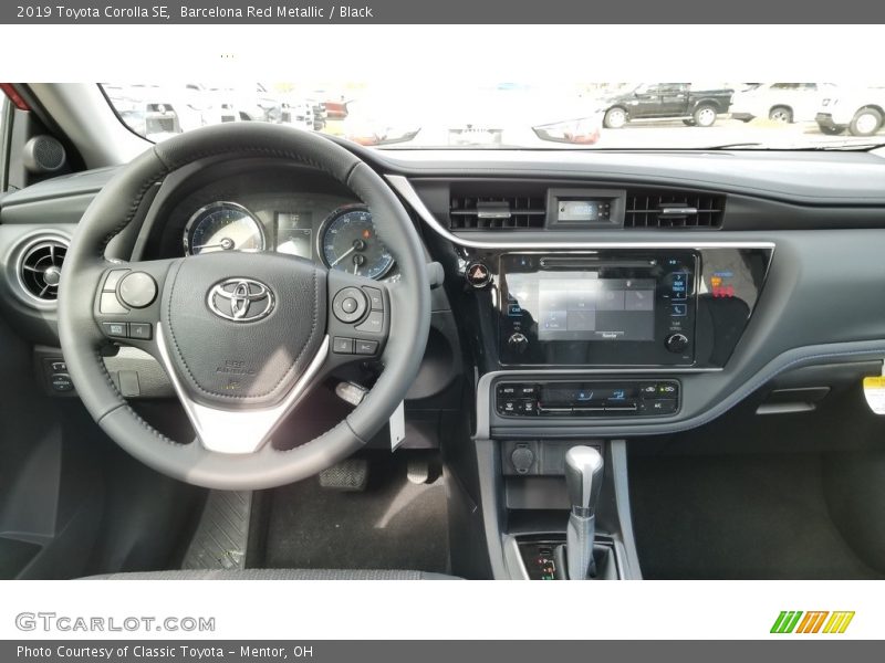 Barcelona Red Metallic / Black 2019 Toyota Corolla SE