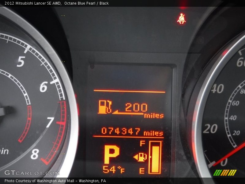 Octane Blue Pearl / Black 2012 Mitsubishi Lancer SE AWD