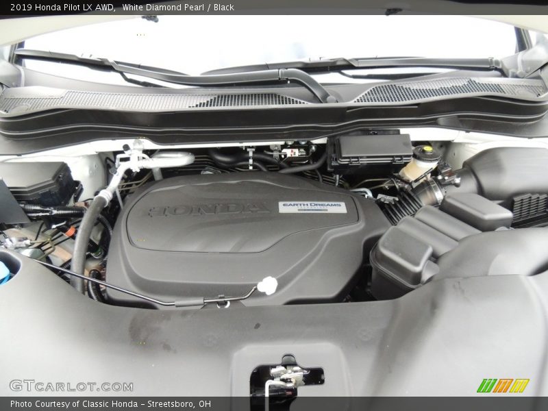 White Diamond Pearl / Black 2019 Honda Pilot LX AWD