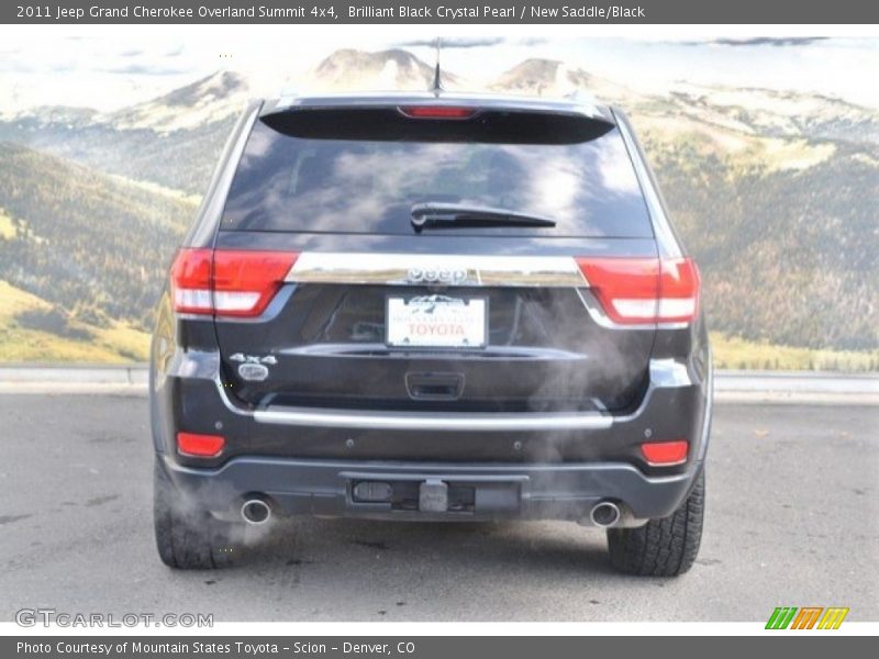 Brilliant Black Crystal Pearl / New Saddle/Black 2011 Jeep Grand Cherokee Overland Summit 4x4