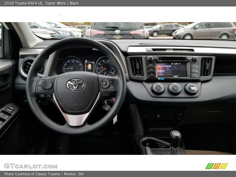 Super White / Black 2018 Toyota RAV4 LE