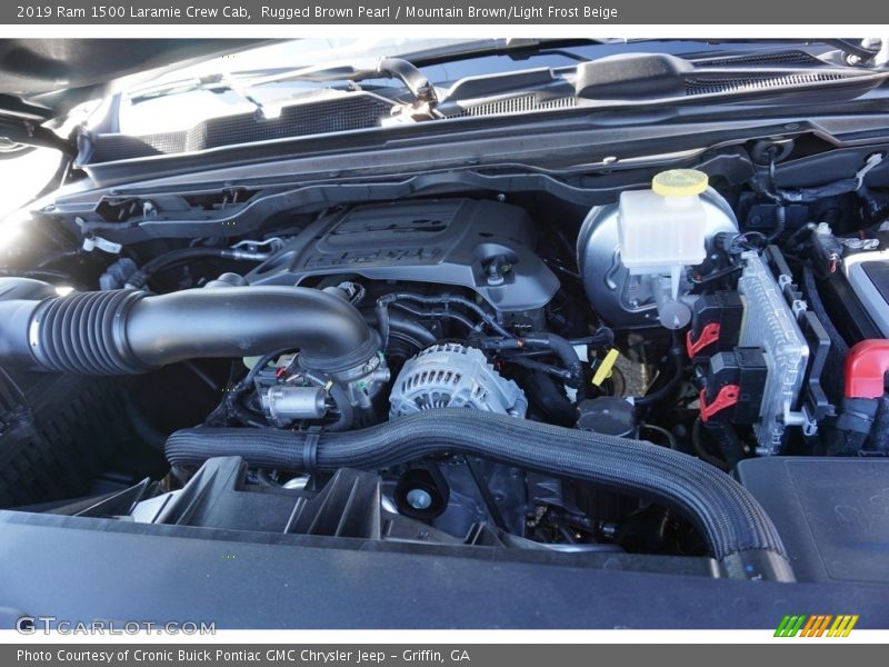 Rugged Brown Pearl / Mountain Brown/Light Frost Beige 2019 Ram 1500 Laramie Crew Cab