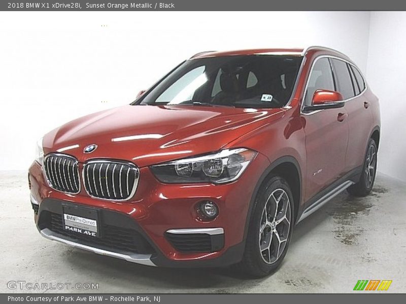 Sunset Orange Metallic / Black 2018 BMW X1 xDrive28i