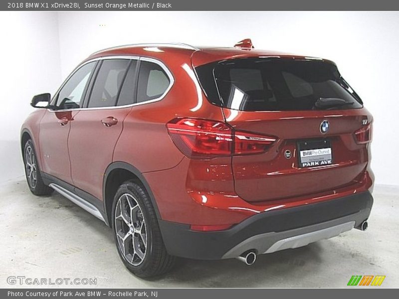 Sunset Orange Metallic / Black 2018 BMW X1 xDrive28i