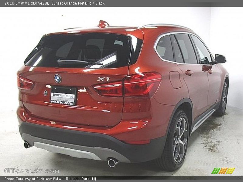 Sunset Orange Metallic / Black 2018 BMW X1 xDrive28i