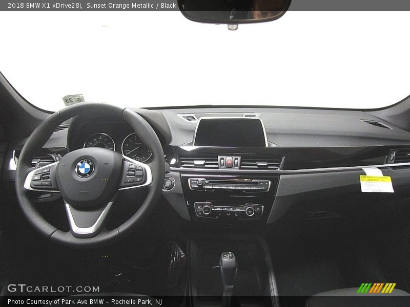 Sunset Orange Metallic / Black 2018 BMW X1 xDrive28i