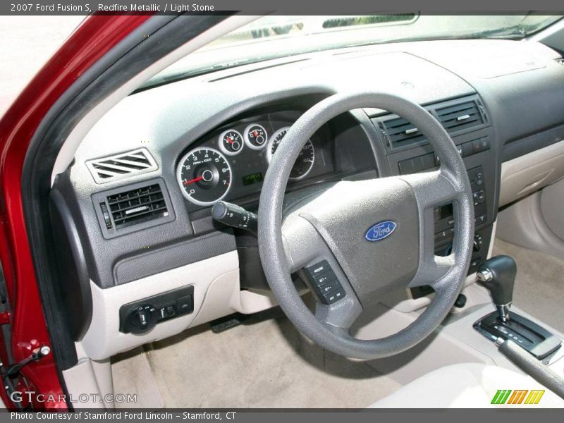 Redfire Metallic / Light Stone 2007 Ford Fusion S