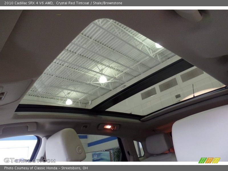 Crystal Red Tintcoat / Shale/Brownstone 2010 Cadillac SRX 4 V6 AWD