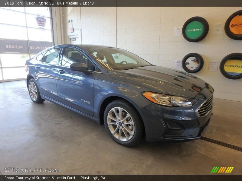 Front 3/4 View of 2019 Fusion Hybrid SE