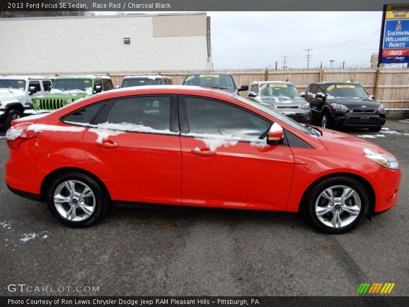 Race Red / Charcoal Black 2013 Ford Focus SE Sedan