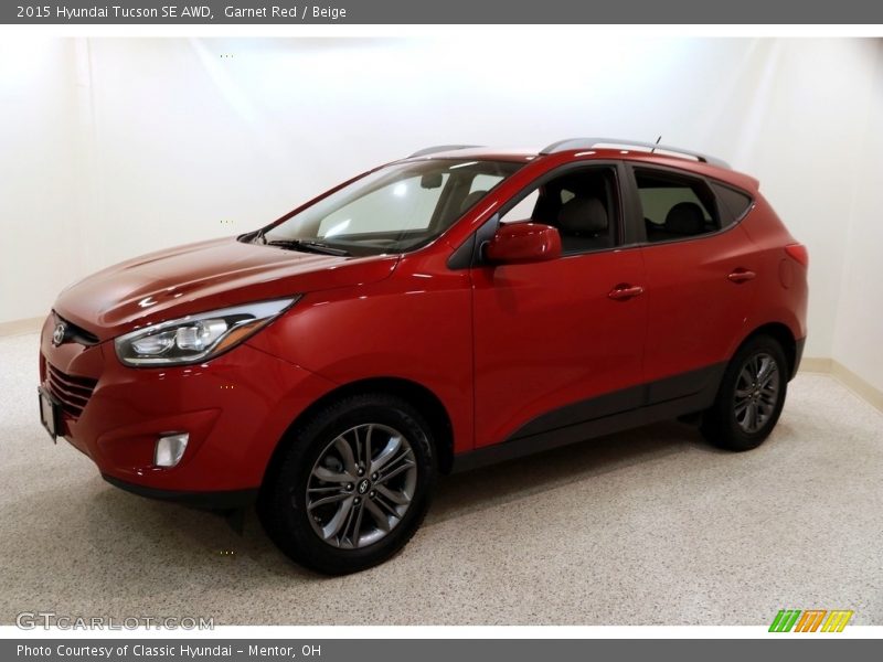 Garnet Red / Beige 2015 Hyundai Tucson SE AWD