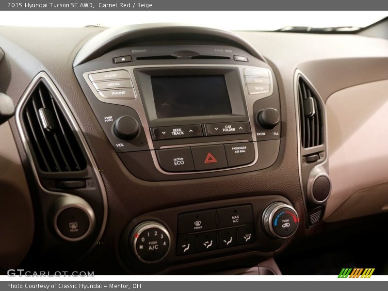 Garnet Red / Beige 2015 Hyundai Tucson SE AWD