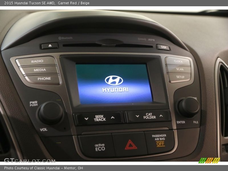 Garnet Red / Beige 2015 Hyundai Tucson SE AWD