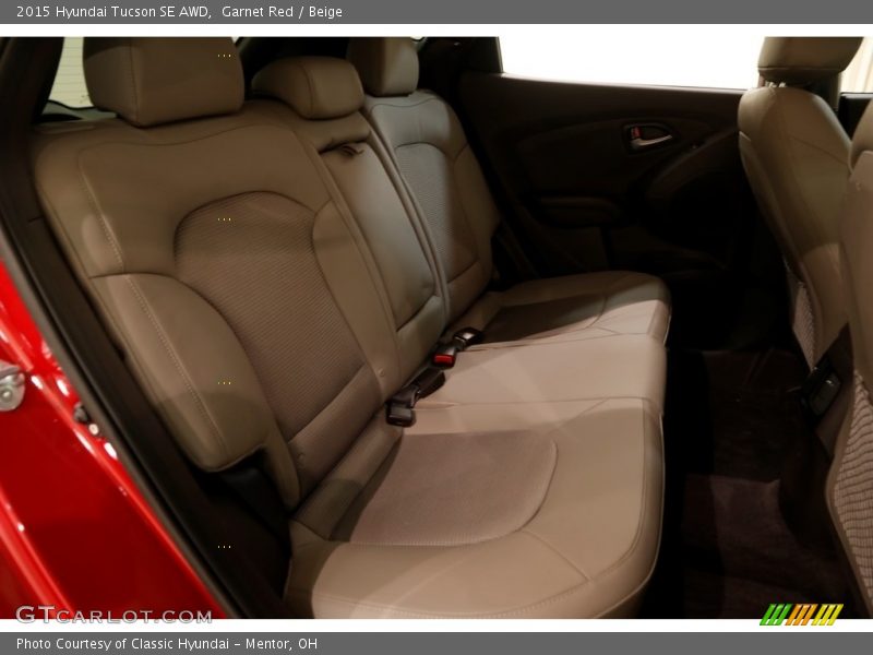 Garnet Red / Beige 2015 Hyundai Tucson SE AWD