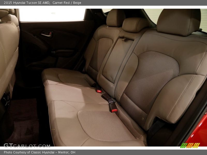 Garnet Red / Beige 2015 Hyundai Tucson SE AWD