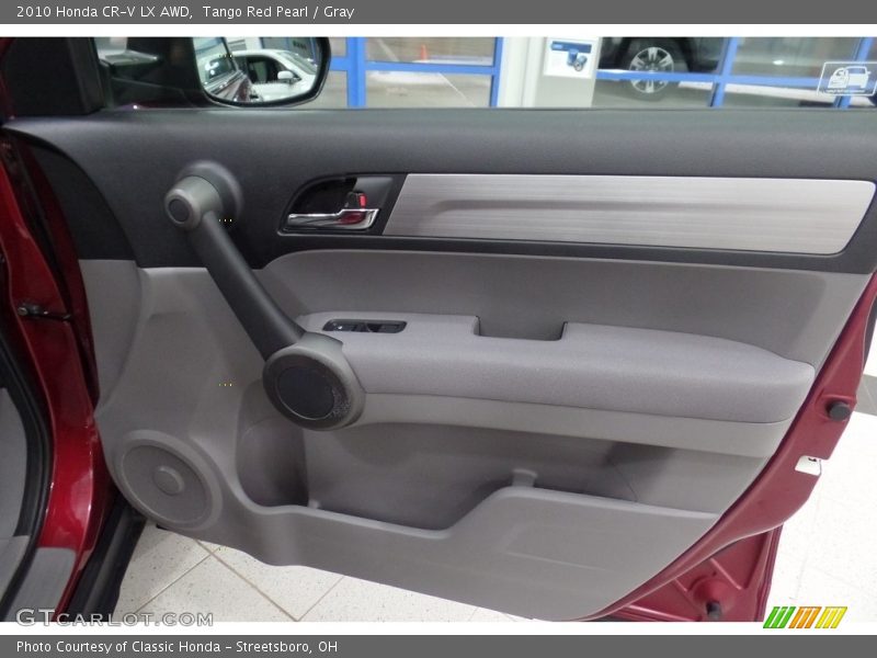 Tango Red Pearl / Gray 2010 Honda CR-V LX AWD