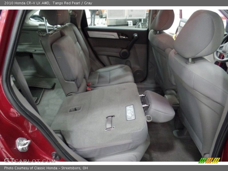 Tango Red Pearl / Gray 2010 Honda CR-V LX AWD
