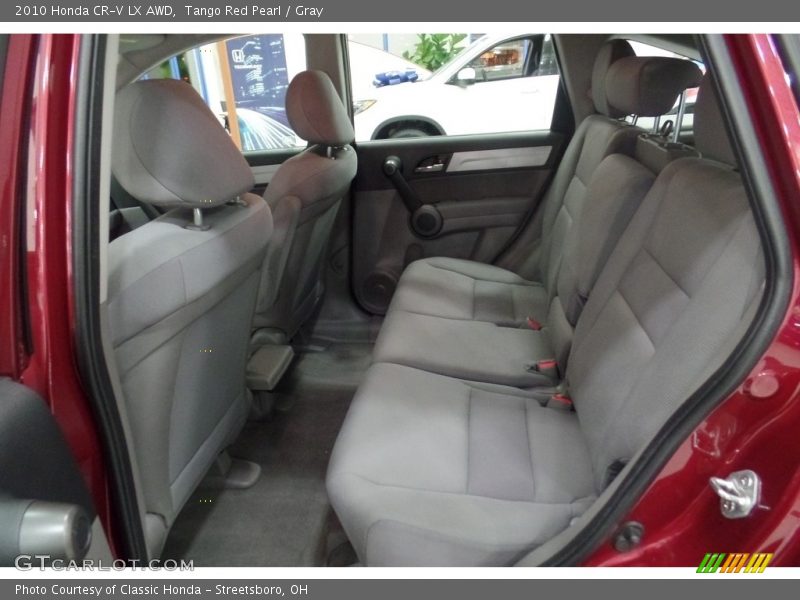 Tango Red Pearl / Gray 2010 Honda CR-V LX AWD