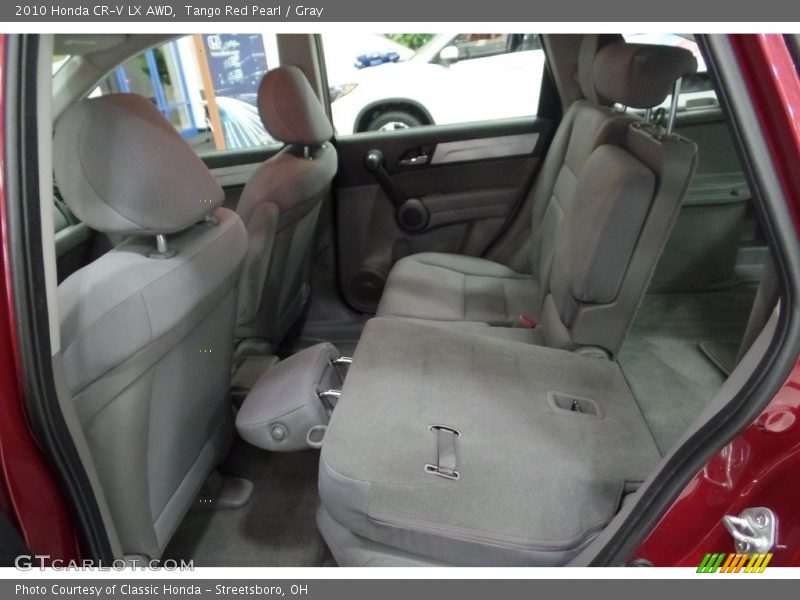 Tango Red Pearl / Gray 2010 Honda CR-V LX AWD