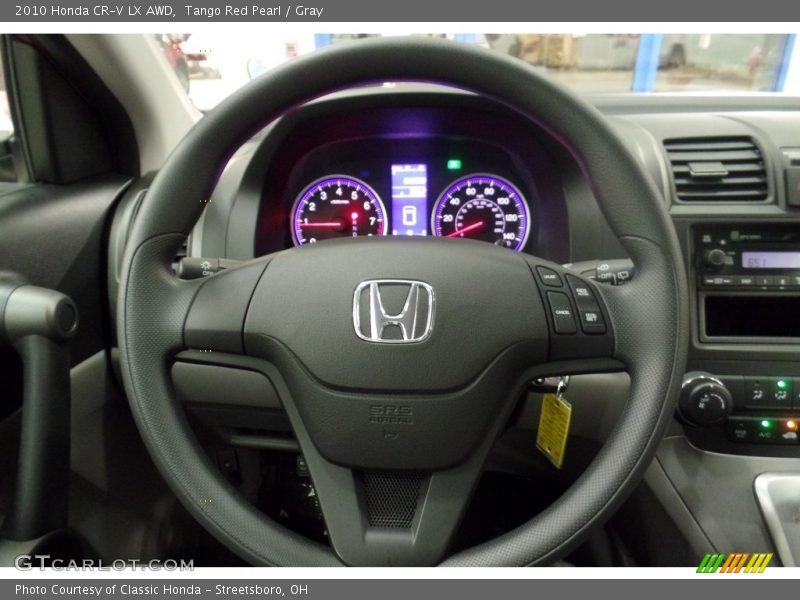 Tango Red Pearl / Gray 2010 Honda CR-V LX AWD