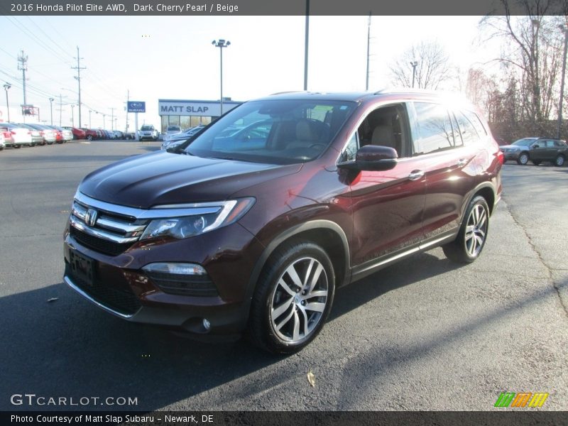 Dark Cherry Pearl / Beige 2016 Honda Pilot Elite AWD