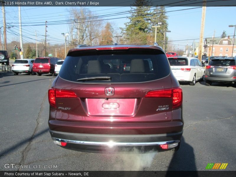 Dark Cherry Pearl / Beige 2016 Honda Pilot Elite AWD