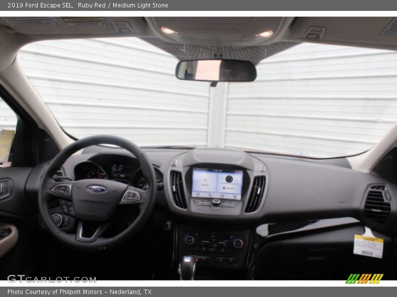 Ruby Red / Medium Light Stone 2019 Ford Escape SEL