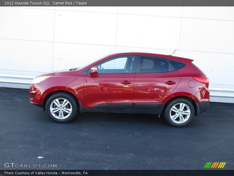 Garnet Red / Taupe 2012 Hyundai Tucson GLS