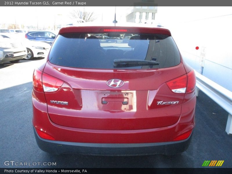 Garnet Red / Taupe 2012 Hyundai Tucson GLS