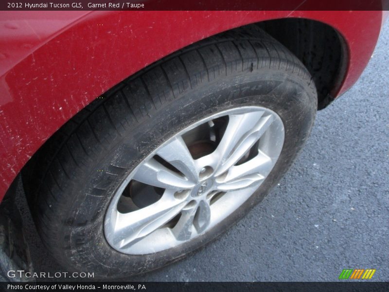 Garnet Red / Taupe 2012 Hyundai Tucson GLS