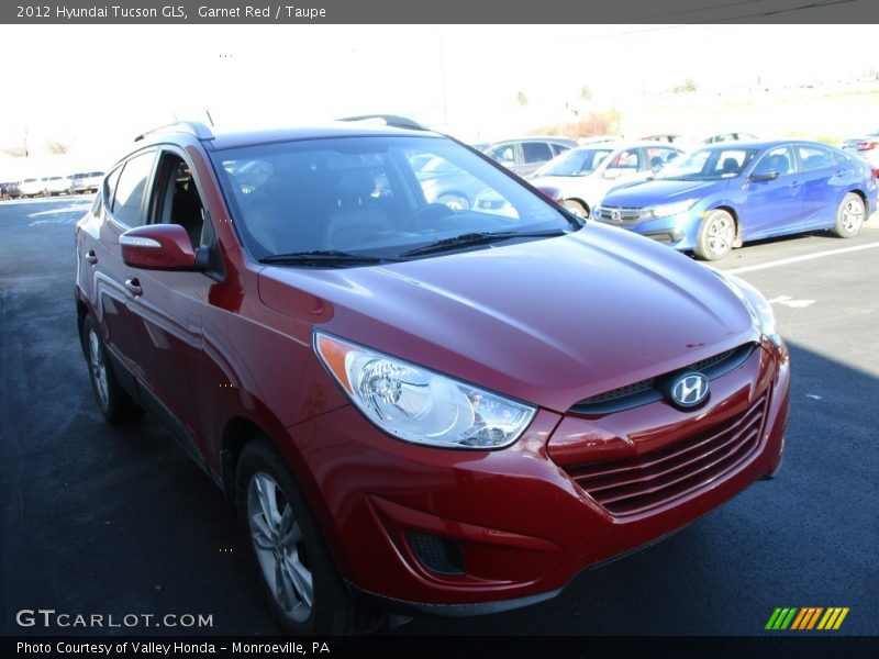 Garnet Red / Taupe 2012 Hyundai Tucson GLS