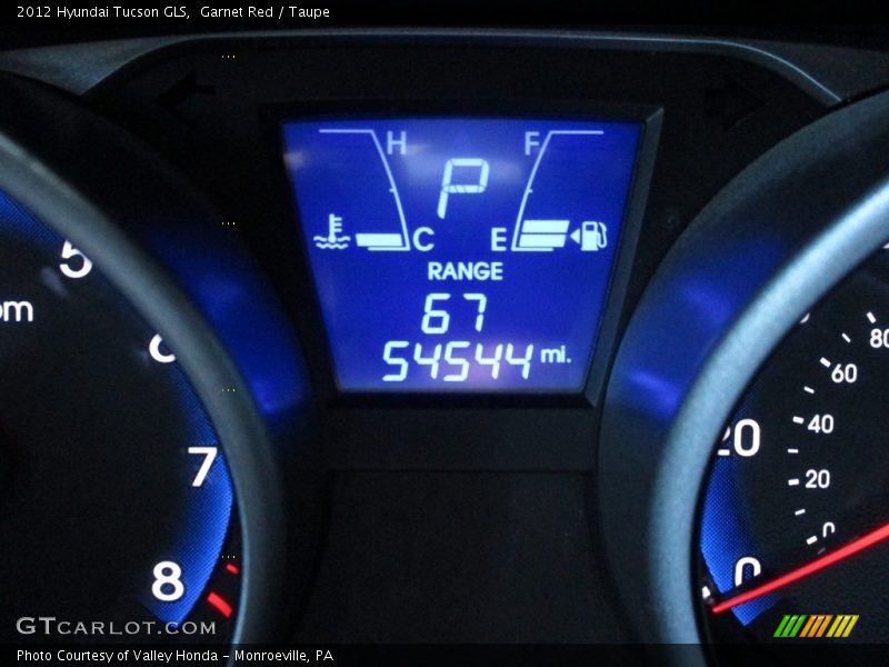 Garnet Red / Taupe 2012 Hyundai Tucson GLS