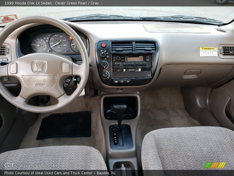 Clover Green Pearl / Gray 1999 Honda Civic LX Sedan