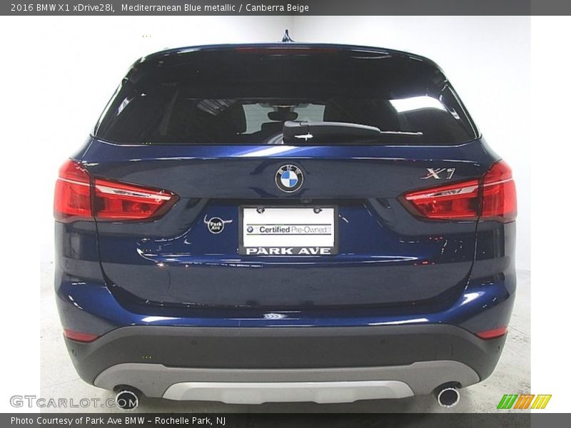Mediterranean Blue metallic / Canberra Beige 2016 BMW X1 xDrive28i