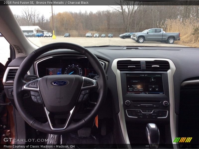 Bronze Fire Metallic / Charcoal Black 2016 Ford Fusion SE