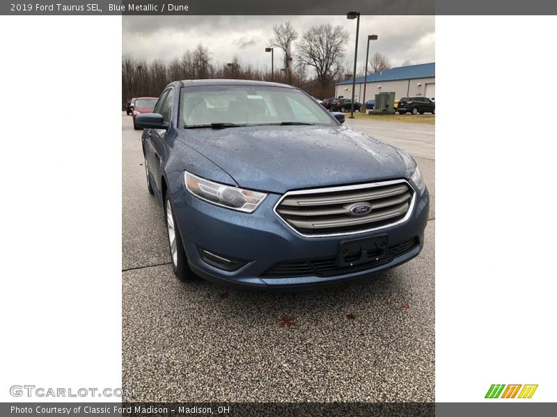 Blue Metallic / Dune 2019 Ford Taurus SEL