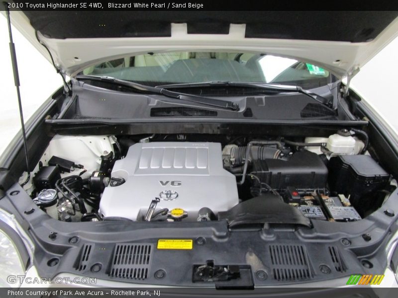 Blizzard White Pearl / Sand Beige 2010 Toyota Highlander SE 4WD
