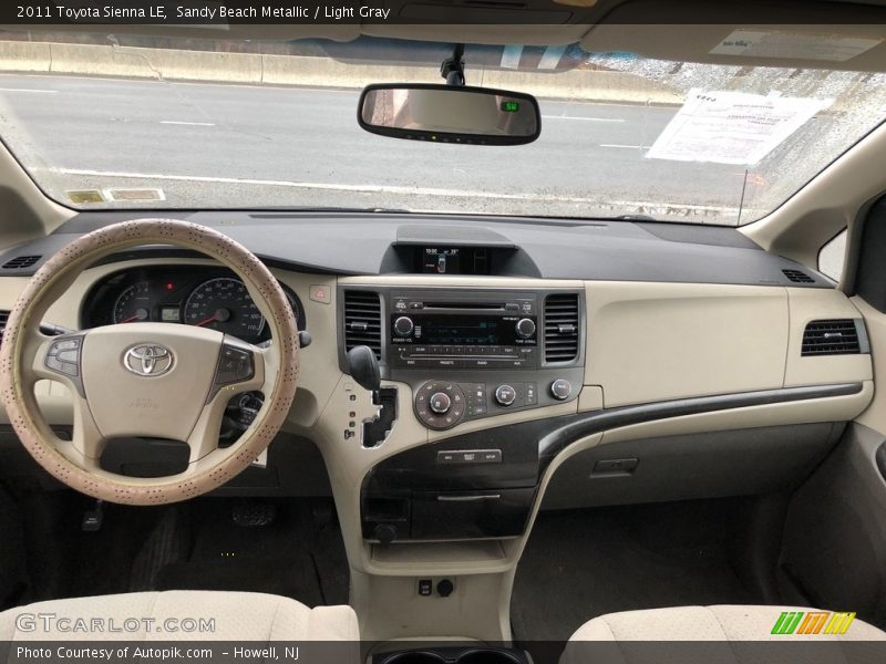 Sandy Beach Metallic / Light Gray 2011 Toyota Sienna LE