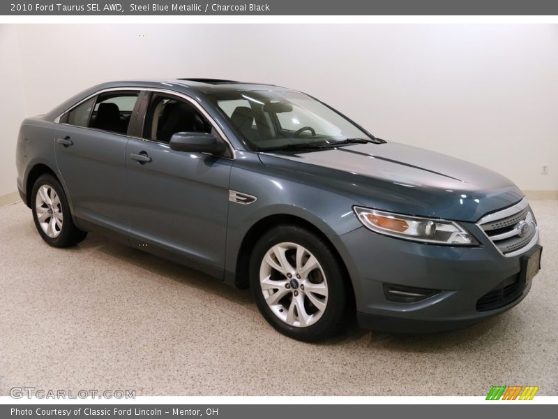 Steel Blue Metallic / Charcoal Black 2010 Ford Taurus SEL AWD