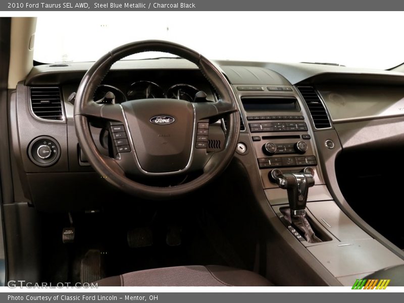 Steel Blue Metallic / Charcoal Black 2010 Ford Taurus SEL AWD