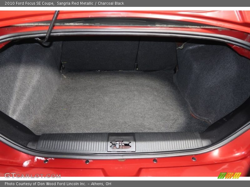 Sangria Red Metallic / Charcoal Black 2010 Ford Focus SE Coupe