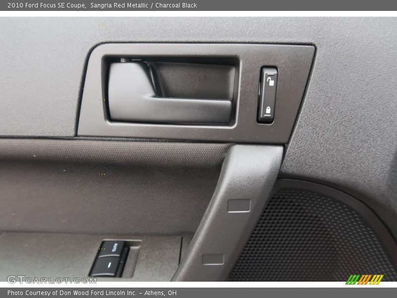 Sangria Red Metallic / Charcoal Black 2010 Ford Focus SE Coupe