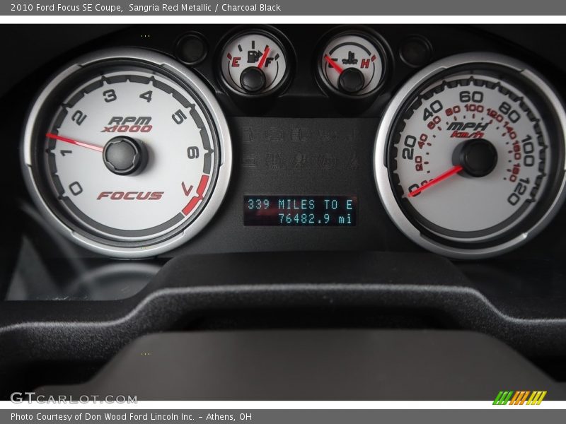 Sangria Red Metallic / Charcoal Black 2010 Ford Focus SE Coupe