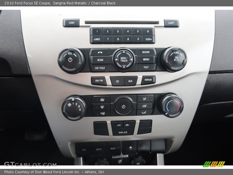 Sangria Red Metallic / Charcoal Black 2010 Ford Focus SE Coupe