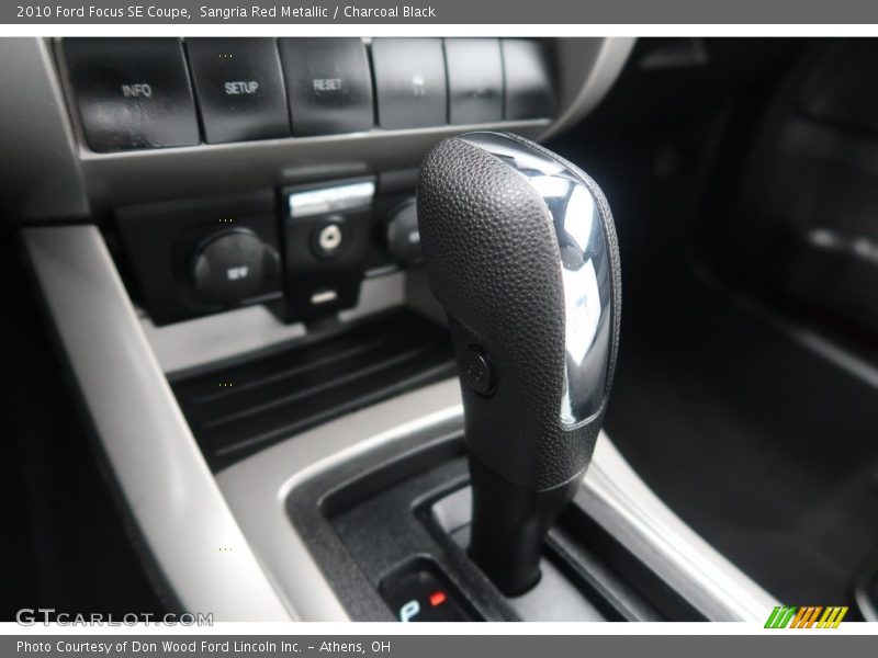 Sangria Red Metallic / Charcoal Black 2010 Ford Focus SE Coupe