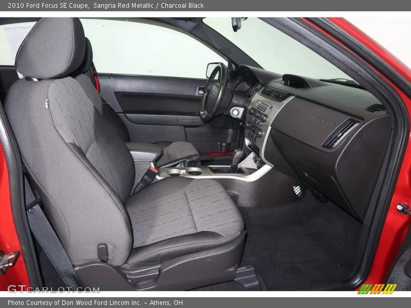 Sangria Red Metallic / Charcoal Black 2010 Ford Focus SE Coupe