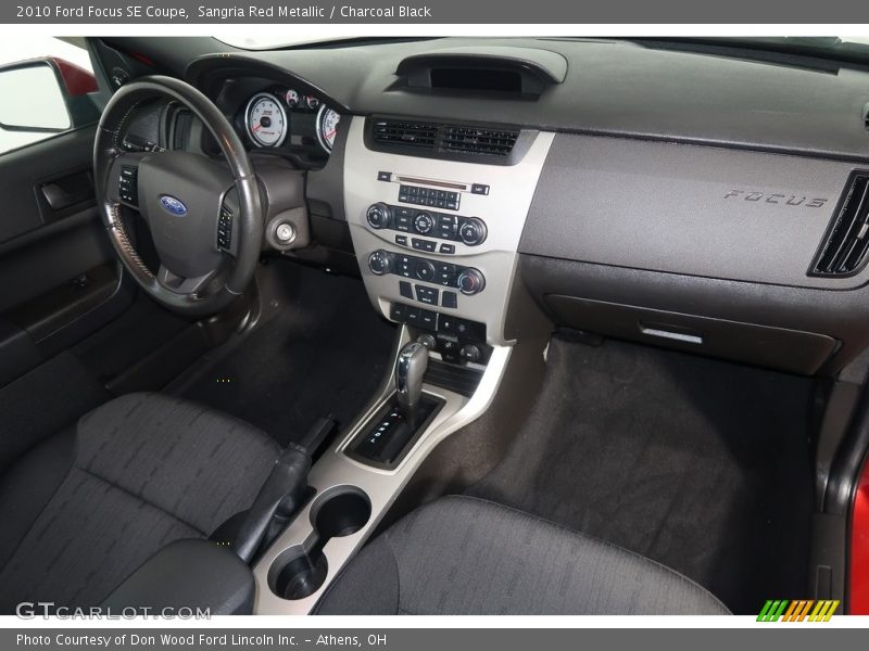 Sangria Red Metallic / Charcoal Black 2010 Ford Focus SE Coupe