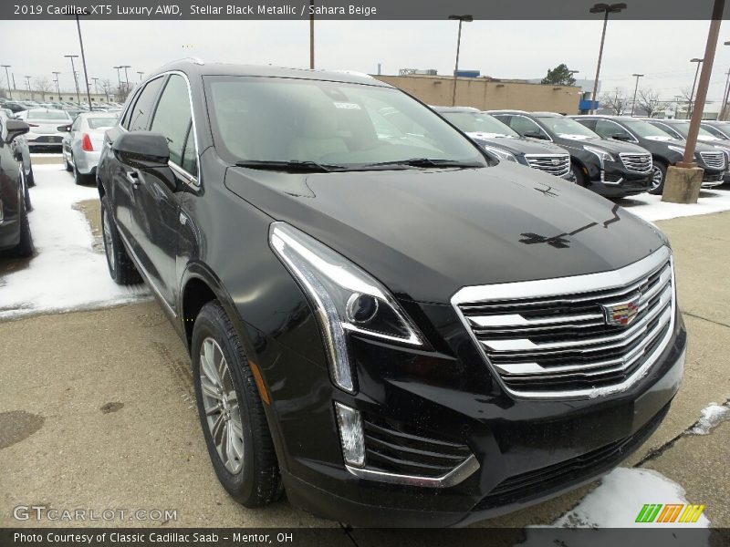 Stellar Black Metallic / Sahara Beige 2019 Cadillac XT5 Luxury AWD