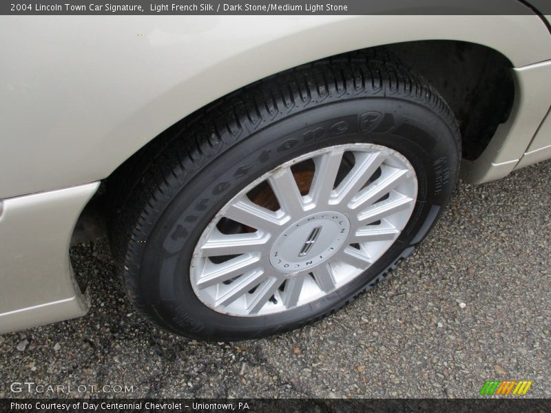 Light French Silk / Dark Stone/Medium Light Stone 2004 Lincoln Town Car Signature